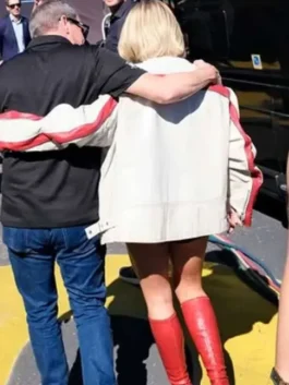 Full back view of Sydney Sweeney white leather jacket showing rear panel and red sleeve stripes