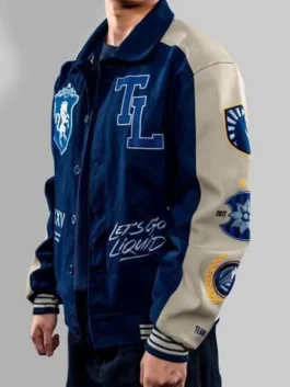 Side view of Team Liquid 2025 varsity jacket with logo patches and striped rib-knit trims