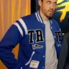 Andrew Koji Street Fighter Blue Varsity Jacket front view.