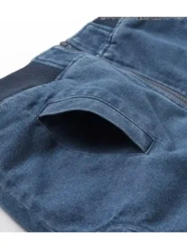 Close-up pocket detail of Dragon Ball x BREEZE Denim Boa Jacket with premium blue denim texture