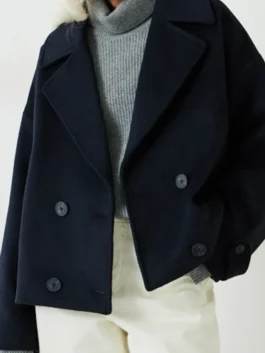 Criminal Record wool peacoat with clean front design and polished coat look.
