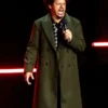 Eric André Street Fighter CinemaCon 2026 Green Coat front view.