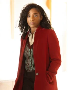 Faith Mitchell TV series coat with red color and elegant outerwear appeal.