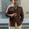 In the Grey 2026 Henry Cavill Brown Jacket with rugged movie-inspired styling.