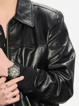 Jung Kook leather jacket with sleek black outerwear look.