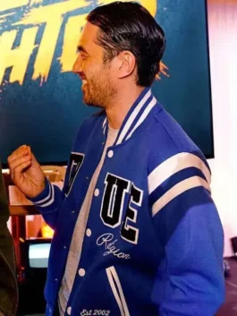 Andrew Koji blue varsity jacket inspired by Street Fighter style.