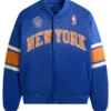 New York Knicks Patrick Ewing Blue Varsity Jacket with classic NBA-inspired styling.