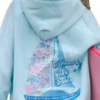 Pink Palm Puff Chase The Sun sky blue oversized hoodie with beach-inspired graphic design