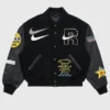 Raspberry Hills x Nike Black Varsity Jacket with bold streetwear-inspired styling.