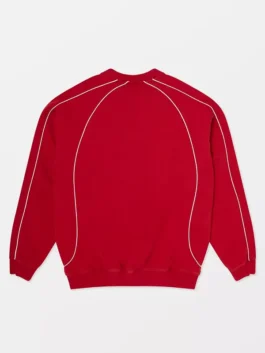 Saturday Night Live red sweatshirt with simple front design and relaxed fit.