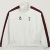 Adidas x Willy Chavarria Woven Jacket front view with white woven fabric, zip closure, and track styling
