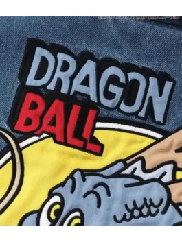 Close-up of Dragon Ball x BREEZE Denim Boa Jacket featuring embroidered Dragon Ball logo patch on blue denim
