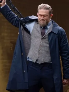Charlie Hunnam The Gentlemen Coat with dark blue cotton texture, full sleeves, and sharp formal styling