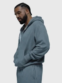 Drake Janice STFU Tracksuit in grey fleece with soft structure and relaxed soundtrack-inspired style