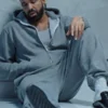 Drake Janice STFU Tracksuit with grey fleece texture, hooded collar, and easy full-sleeve design