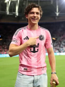 Sleek pink Tom Holland Inter Miami Jersey displaying half-length sleeves and a comfortable round neck outline.
