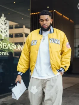 Karl-Anthony Towns Knicks Yellow Jacket with yellow satin shine, ribbed details, and relaxed game-day fit