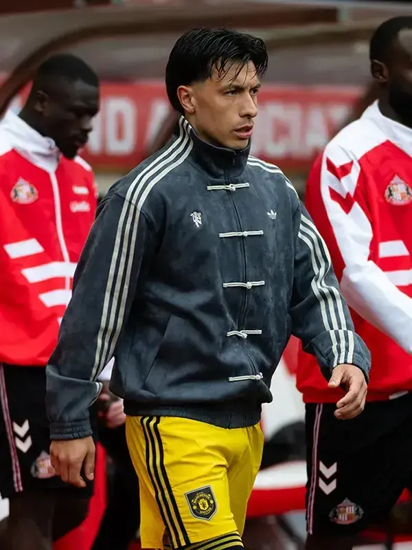 Manchester United player in grey Adidas CNY jacket with four knot buttons during Premier League Matchday 36 walkout at Sunderland