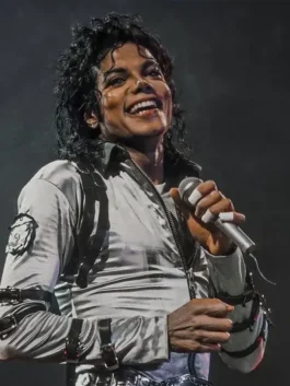 Michael Jackson Silver Bad Era Jacket in silver satin with belt strap sleeve details and sharp stage style