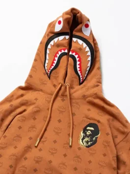 MCM x BAPE Monogram Shark Hoodie in pullover style with shark hood artwork and monogram pattern