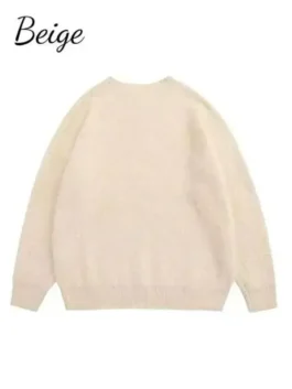 The Unavowed Sweater back view with knitted texture, smooth rear shape, and ribbed hem finish