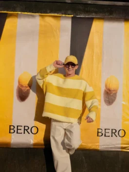 Front view of the Tom Holland Yellow Stripe Sweatshirt, highlighting the thick yellow and white stripes and quality fabric.