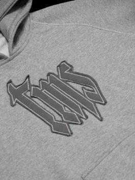 Relaxed fit unisex TMS Grey Hoodie crafted from warm fleece fabric with a pullover closure and a casual hood.