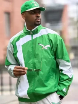 The HOMAGE x Starter Eagles Jacket with elastic cuffs, an elastic hem, and two functional outside pockets.