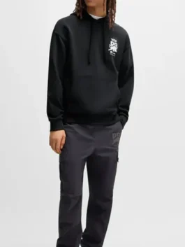 Model wearing Visa Cash App Racing Bulls black blur hoodie with relaxed streetwear fit