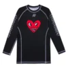 A&P x Keith Haring HEART LS Rashguard front view with black design, long sleeves, and signature artwork