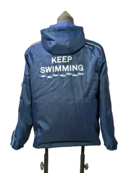 The back profile of the BTS Keep Swimming Blue Jacket highlighting the clean jacket line and long raglan sleeves.