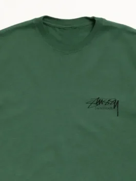 Stussy Beach Roots T Shirt closeup view featuring premium fabric texture, detailed graphics, and quality craftsmanship