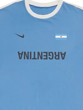 Cactus Jack Nike Argentina Total 90 T Shirt front closeup showcasing premium fabric texture and retro football-inspired detailing