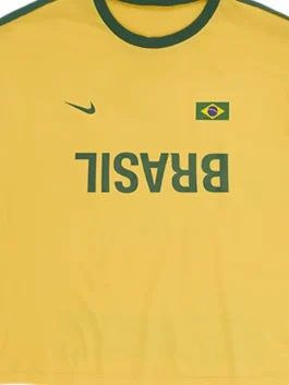 Cactus Jack Nike Total 90 Brasil T Shirt front closeup displaying premium fabric texture and detailed sportswear graphics