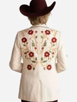 The back view of the Dutton Ranch Beulah Jackson Floral Blazer highlighting the smooth drape dynamics and clean floral patterns.