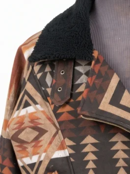 Close-up of the black sherpa collar, asymmetrical zip closure, and decorative throat latch detailing.