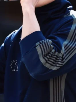 Jungkook NEEDLES Tracksuit with blue colorway, sporty design, and premium streetwear appeal