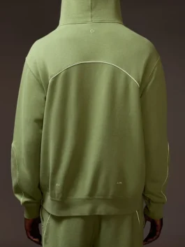 Nike x NOCTA Fleece Hoodie Oil Green model back view with clean design and athletic inspiration