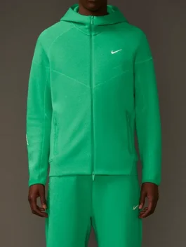 NOCTA Tech Fleece Full Zip Hoodie Stadium Green model front view displaying a relaxed athletic fit