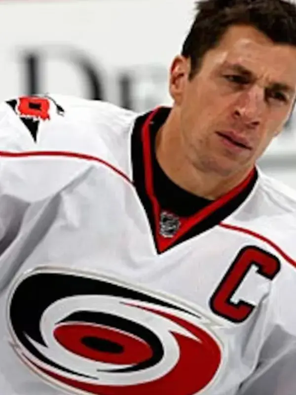 A premium multicolor Rod Brind'Amour Carolina Hurricanes 2006 White Jersey featuring the iconic team emblem and V neck collar.