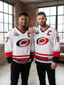 A lifestyle shot of a model wearing the loose fit Rod Brind'Amour Carolina Hurricanes 2006 White Jersey with long sleeves.