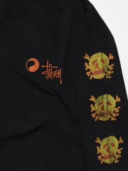 Black Stussy x OL Skull Long Sleeve Tee celebrating the creative partnership between Stussy and Our Legacy through bold graphic design