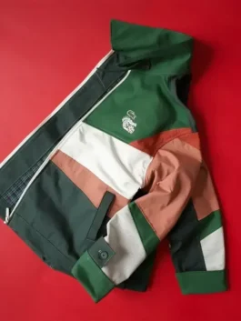 A stylish view of the lacoste mexico jacket featuring full length sleeves, open hem cuffs, and a soft viscose lining.