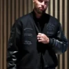 Front view of the Stephen Curry MMXXVI Li-Ning Jacket showcasing the snap tap button closure and rib knitted collar.