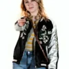 Close-up front profile of the black and white All Night Wrong Maria Bakalova Varsity Jacket detailing the zipper closure and floral print.