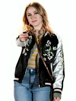 Close-up front profile of the black and white All Night Wrong Maria Bakalova Varsity Jacket detailing the zipper closure and floral print.