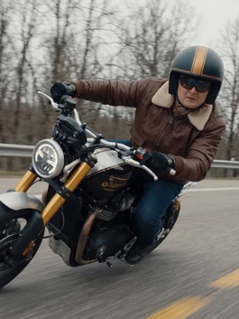 Brown real leather Matchbox the Movie Arturo Castro Leather Jacket featuring a shirt style fur collar and front zipper closure.