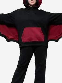 Close view highlighting the deep kangaroo storage pocket and rich black texture of the Steady Hands Bat Wing Hoodie.