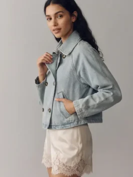 Model view of the blue denim Battle On The Beach Sarah Denim Jacket showcasing full length sleeves and clean button detailing.