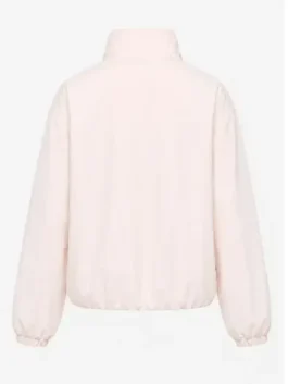 Rear profile view of the blush pink cotton Caitlin Clark Fever vs Liberty Bomber Jacket showing clean back panels and elastic cuffs.